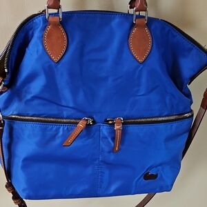 Dooney And Bourke Thick Blue Nylon Tote Bag with Brown Leather Trim.